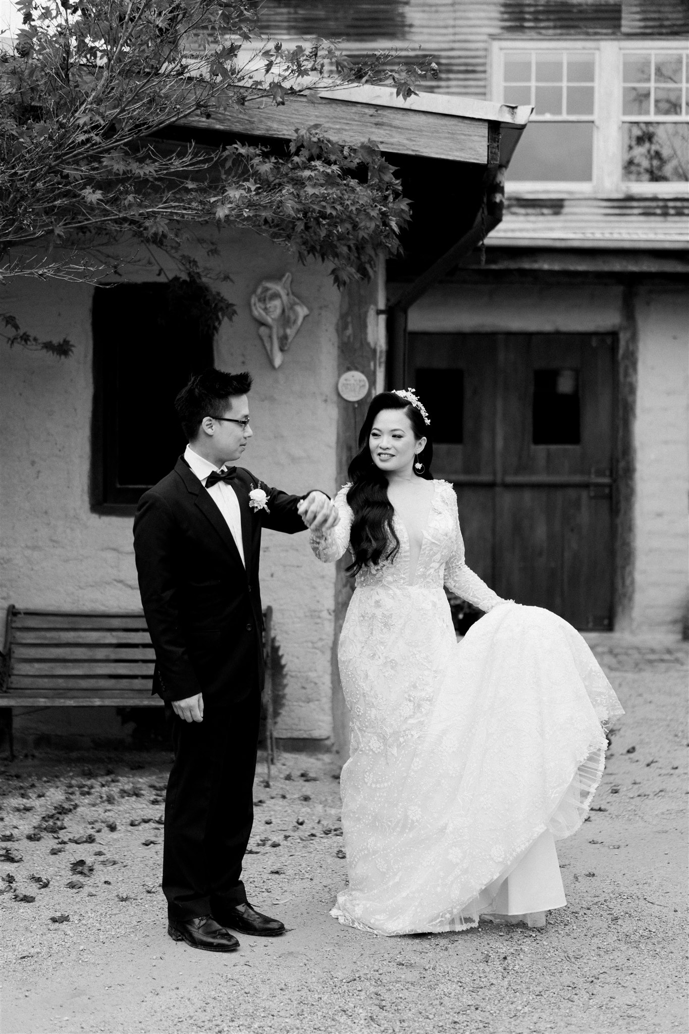 Engaged couple share a dance in front of the barn at Gum Gully Farm during their pre wedding photo shoot
