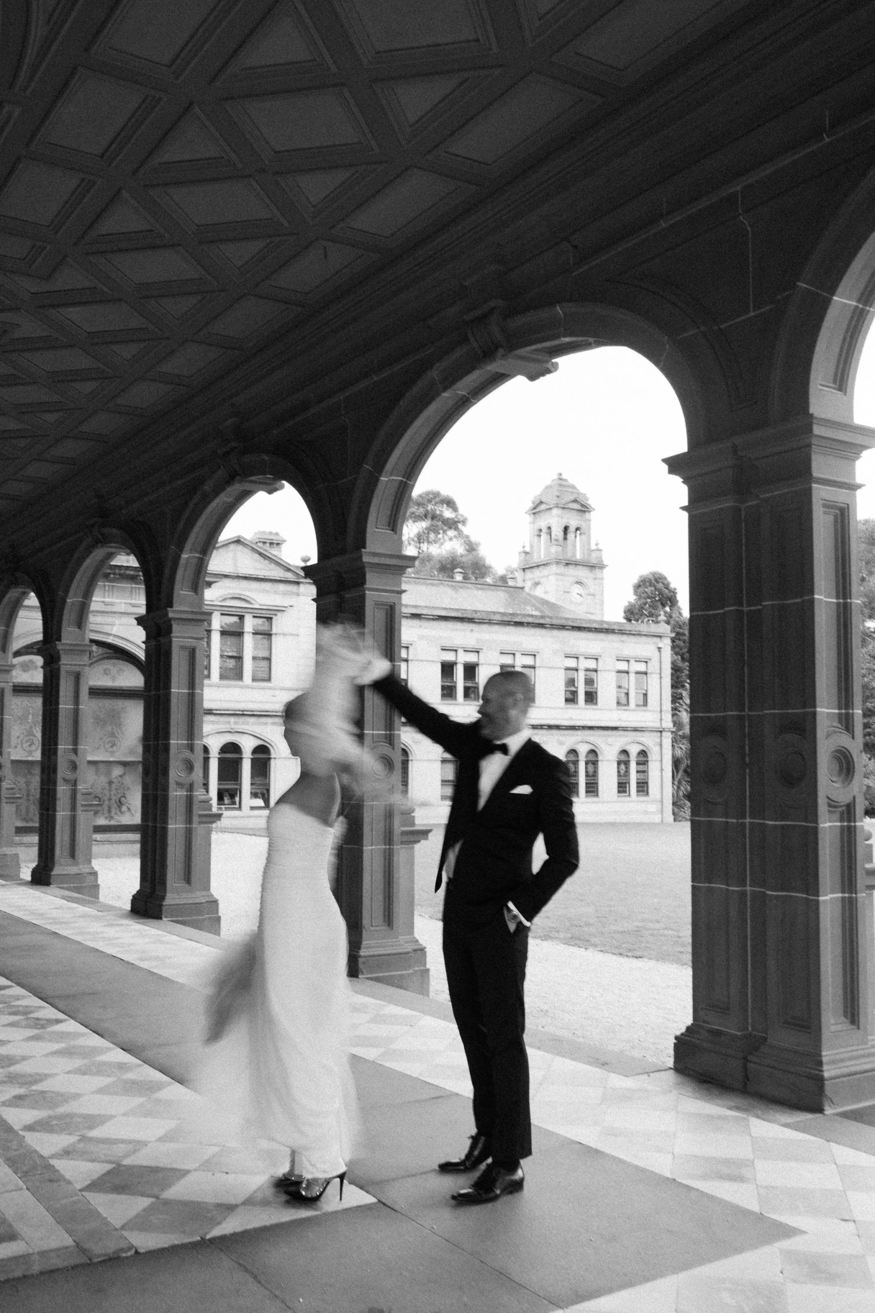 A blurred shot of the bride & groom during portraits