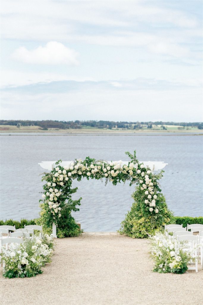 outdoor wedding ceremony at Point Campbell House