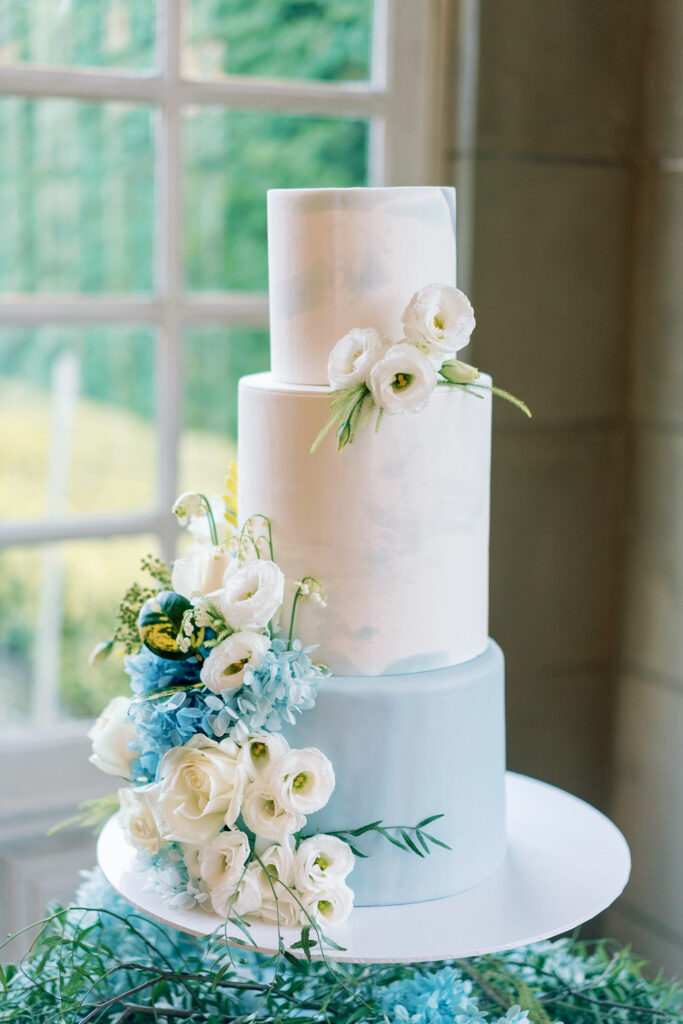 3 tiered blue and white coloured wedding cake