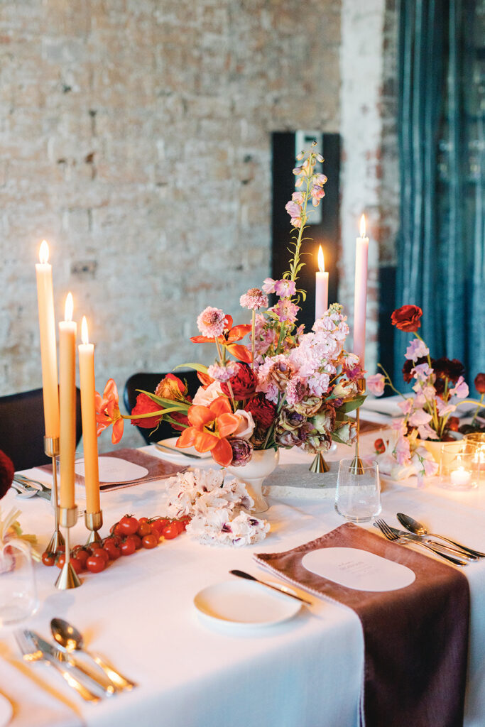 The use of fresh produce in wedding styling tablescapes is a 2024 wedding trend that is here to stay
