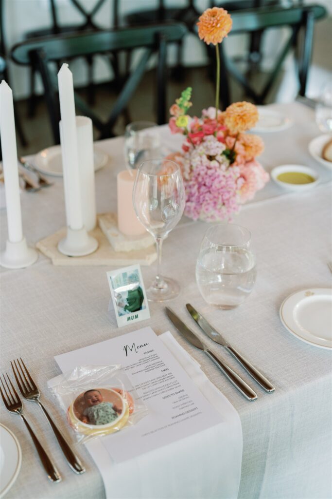 The couple opt to use polaroid pictures of their guests as place cards, personalising their wedding day tablescapes.