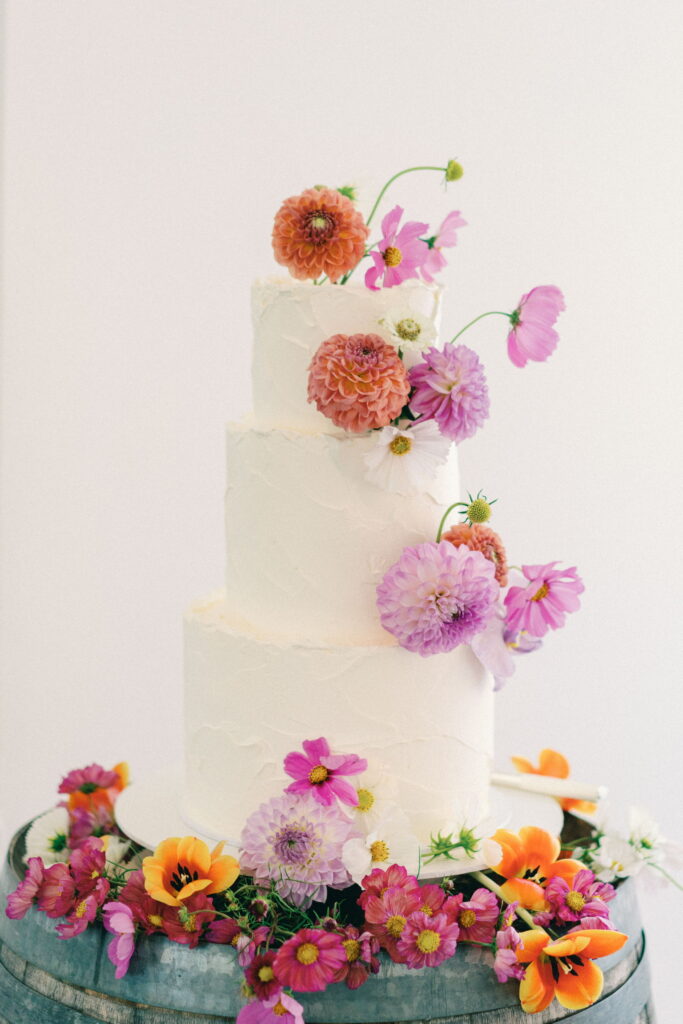 colourful flowers on a wedding cake