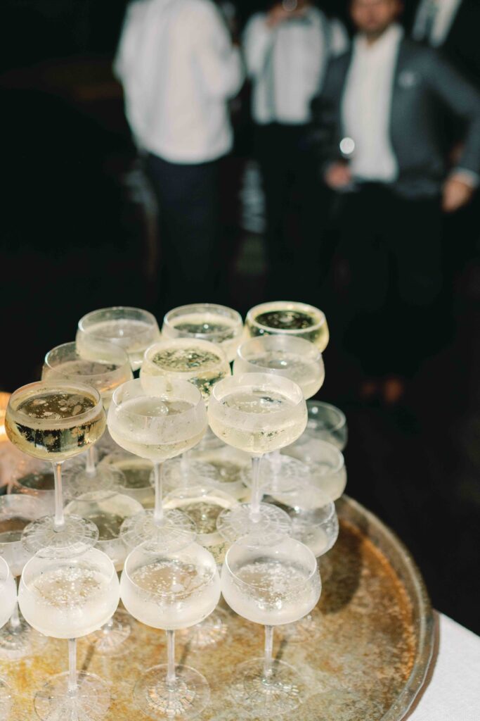 Champagne towers are here to stay and is set to grow as a wedding trend in 2024
